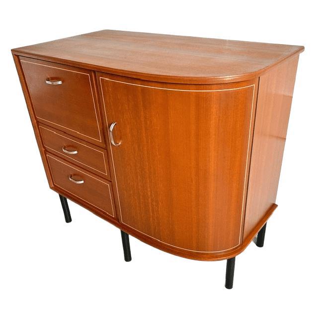 This vintage mid-century Danish-style semi-circular chest of drawers from the 1960s is truly unique. One side of the chest...