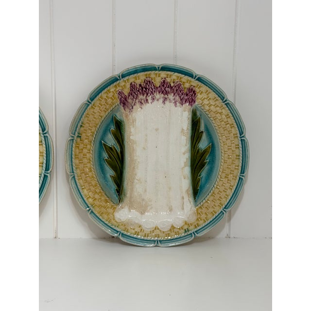 Pair of Antique French Barbotine Asparagus Majolica Plates, Circa 1900 Celebrate the artistry of the French table with...
