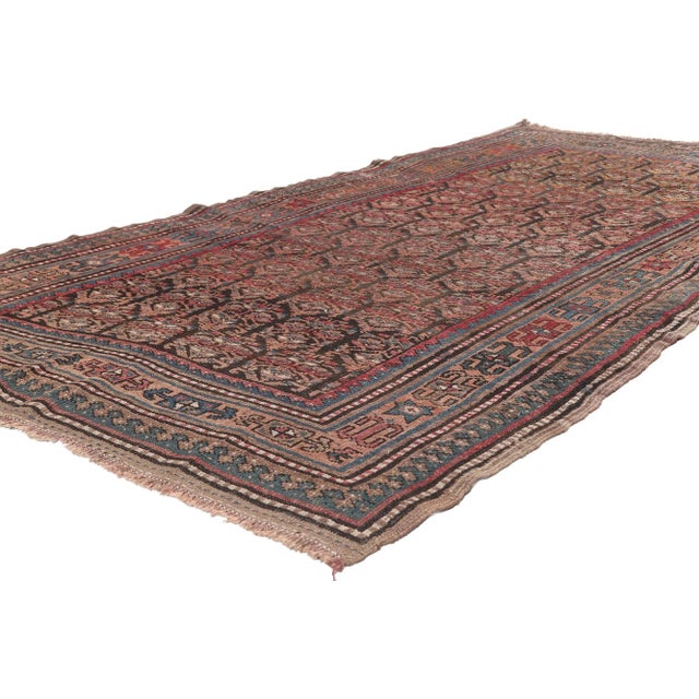 73113 Antique Persian Kurdish Rug 04’03 x 08’00. Rugged beauty meets laid-back luxury in this antique Persian Kurdish rug....