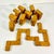 This set of Double-Nine Dominos are a work of art. They have been hand crafted from Oak wood and sealed in a honey finish....
