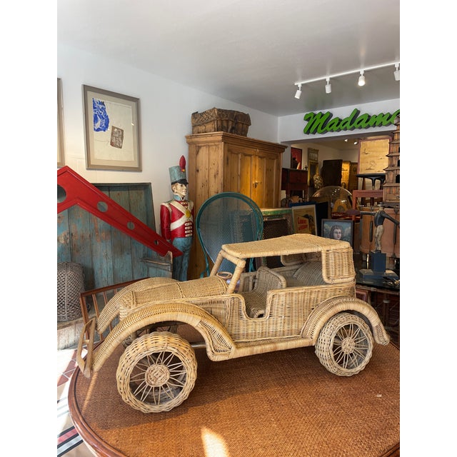 This is a handcrafted vintage woven wicker and rattan model car inspired by 1920s and 1930s luxury automobiles. For the...