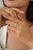 This halo engagement ring features a 0.32 carat pear-shaped blue sapphire set in 18K white gold. The sapphire measuring...