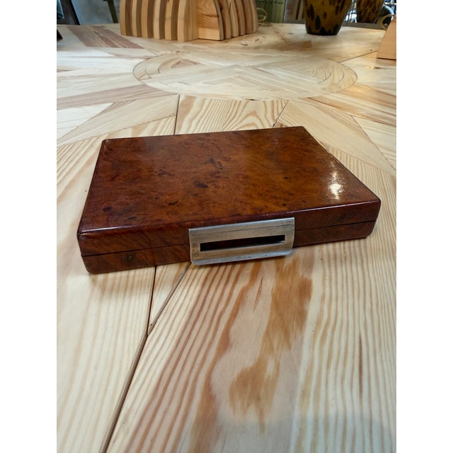 Elegant vintage Italian travel vanity box crafted in richly figured burlwood. The hinged lid opens to reveal a fitted...