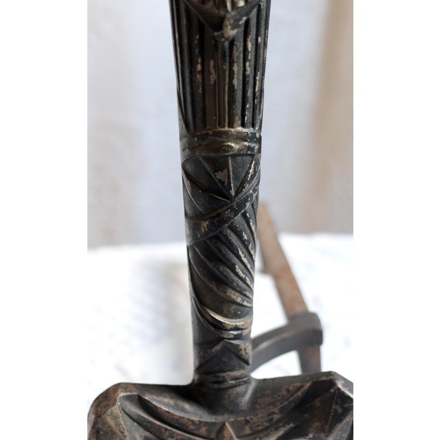 A very detailed Art Deco pair of andirons or firedogs from the early 20th century. Very geometric style typical of Art...