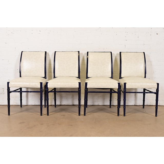A gorgeous set of four mid-century Hollywood Regency side chairs or dining chairs In the manner of Baker Furniture USA,...