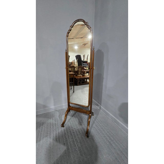 A very nice quality walnut cheval mirror, with flower detailing to the top and bottom, in overall great original...