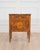 A beautifully proportioned Italian 19th century Louis XVI style bedside table, exquisitely crafted in walnut and richly...