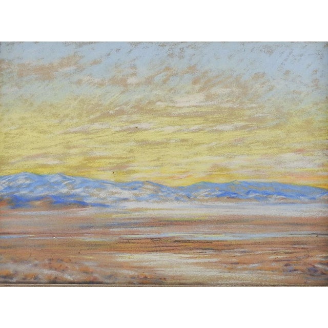 Vintage mid 20th century impressionist pastel on paper painting of mountain desert with yellow sunset. Unsigned. Displayed...
