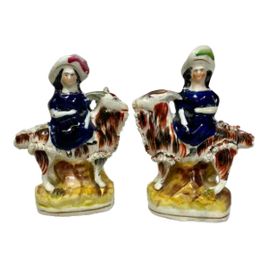 Antique Pair of 19th Century Staffordshire Figurines Depicting Period Dressed Women Riding Goats - From England