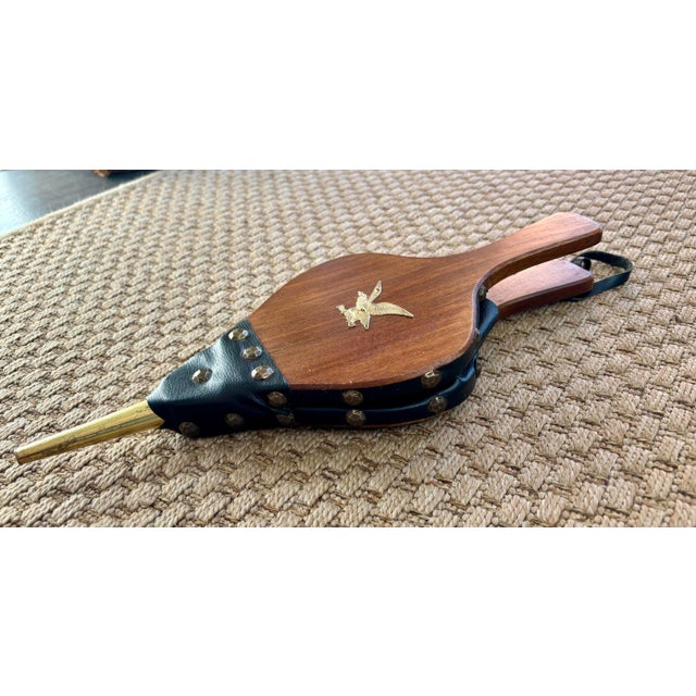 Antique wood, leather and brass fireplace bellows. Circa early 1900s. Still retain a lovely color and patina. The leather...