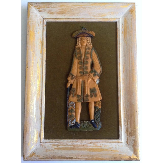 Wax portraits became popular in the 18th century Georgian period in England. As the costume on the gentleman appears to be...