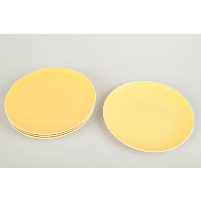 Aluminia Confetti series, mid-20th century. Set of four "Susanne" dinner plates in faience from Aluminia, in the signature...