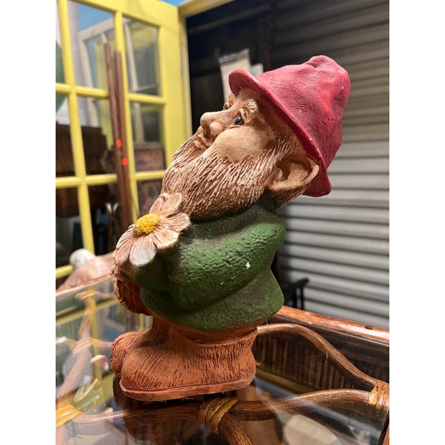 Add cheer and character to your garden with this Garden Gnome Figure. Featuring a red hat with starry eyes looking up...