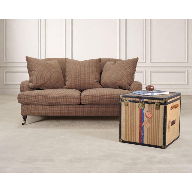 A handsome Country English style sofa, settee, or loveseat designed by Ralph Lauren. The Somerville sofa features a soft...