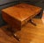 Circa 1810 Regency period sofa table, English. Restrained, elegant design of fine mahogany with ebony inlays. Finely...