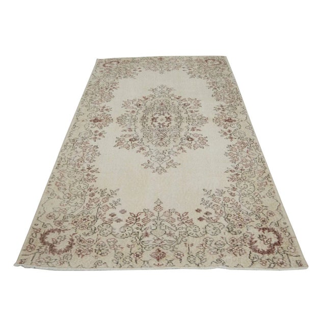 Handknotted vintage rug from Isparta region of Turkey. Approximately 50-60 years old. In very good condition.