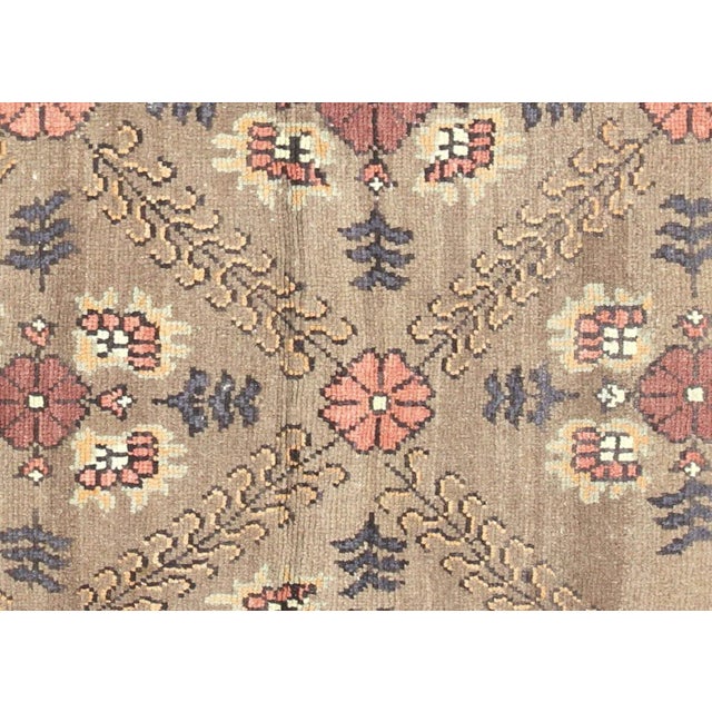 1960s Turkish Oushak Rug. Handwoven with wool on wool foundation in the Oushak region of Western Turkey. The Anatolian...