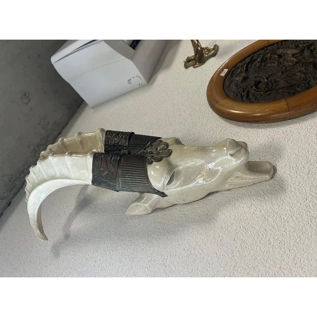 Art deco capricorn wall lamp in very nice original condition. Up to 250V (Europe/UK Standard).The wiring of this item may...