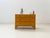 A charming mid-century modern chest of drawers with clean lines and elegant, gently curved legs. The combination of two...