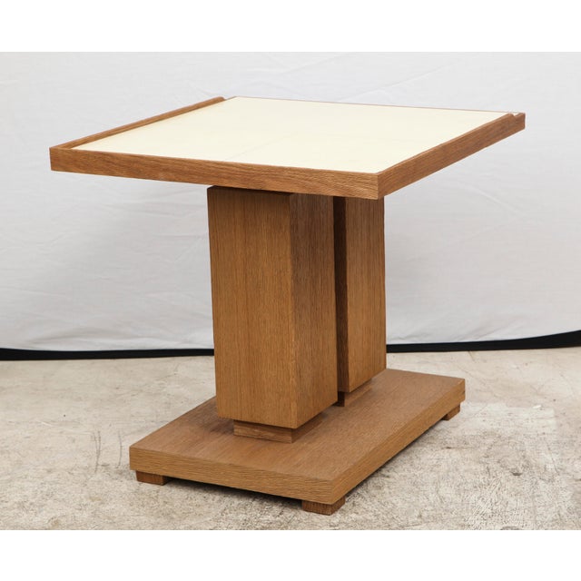 An exquisite Bespoke cerused oak and parchment table in the Dupre Lafon Manner.