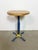 Vintage industrial stool. It features a blue iron leg and a solid wooden seat. The diameter of the seat is 35 cm. The...