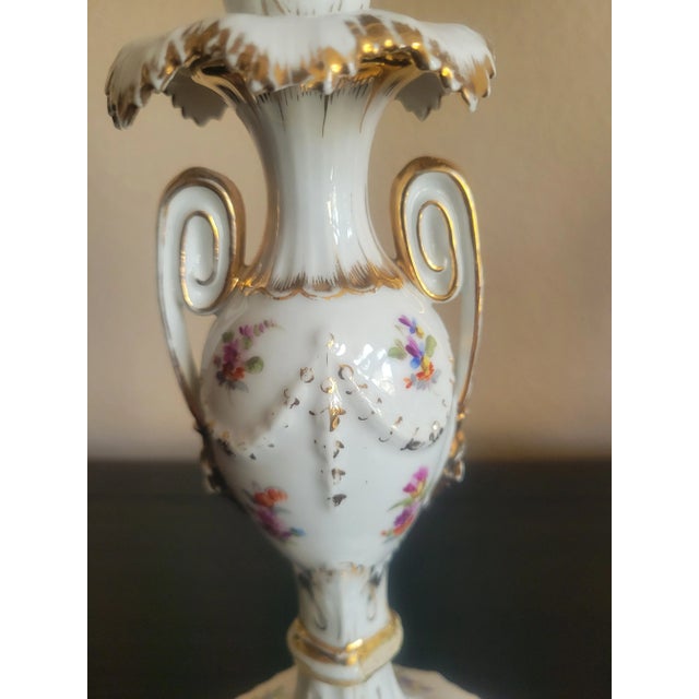 Highly sought after, antique from the 1800's German gold leaf and hand painted with floral detail porcelain candle holder....