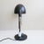 This large desk lamp from hillebrand leuchten is a black table lamp with chrome -plated details from the 1970s. This model...