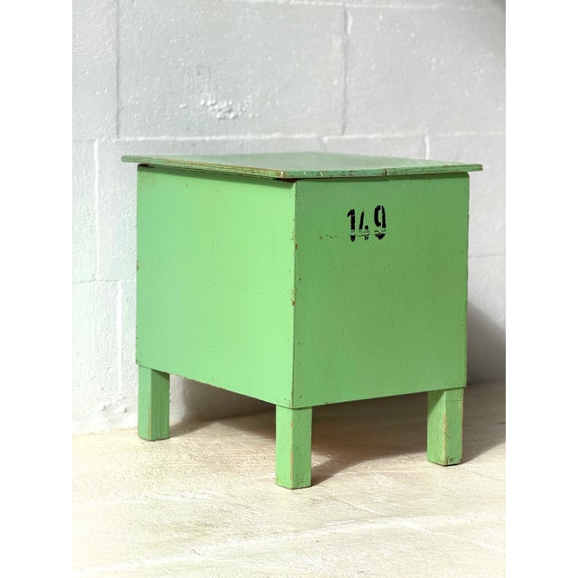 This 50 cm high rustic storage table features a split-lid top that opens to reveal a practical internal compartment,...