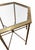 Stylish pair of 1970's American Mid-Century Modern side tables by Mastercraft, crafted in brass with elegant bamboo-form...