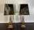 his striking pair of mirrored lamps from the 1960s exemplifies Hollywood Regency style with their bold geometry and...