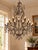 This impressive vintage chandelier makes a dramatic statement, combining classic European elegance with a bold scale that...