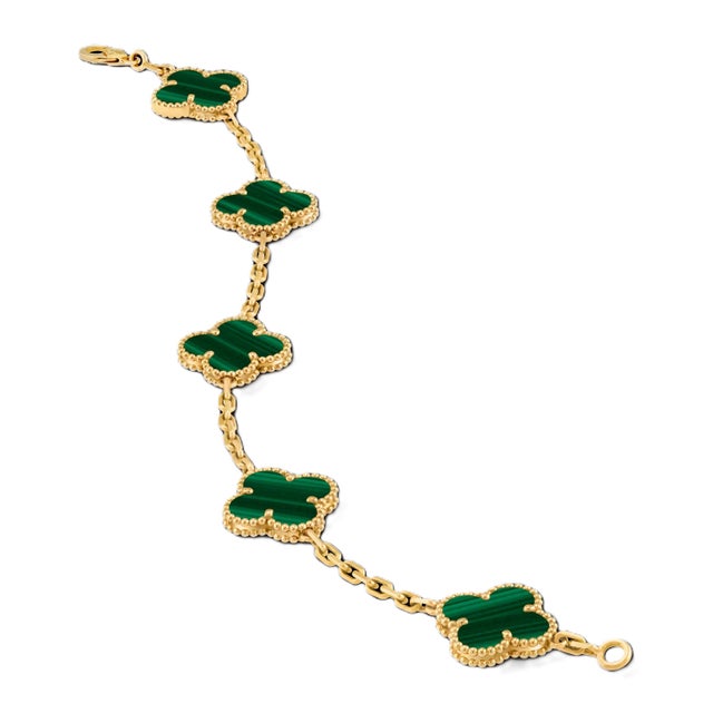 Elevate your jewelry collection with the exquisite Van Cleef & Arpels Alhambra Bracelet, crafted from luxurious 18k yellow...