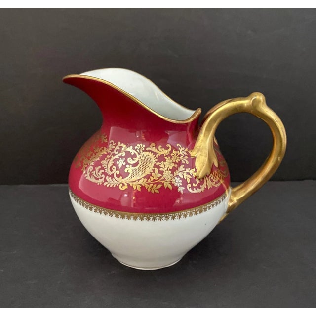 Early 20th c. French Porcelain Cream Pitcher, Remi Delinieres, Burgundy & GOLD This early 20th century French porcelain...