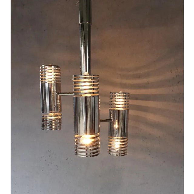 Mid-Century Chromed Spring Chandelier, 1970s, in Very Good conditions. Designed 1970 to 1979 Up to 250V (Europe/UK...