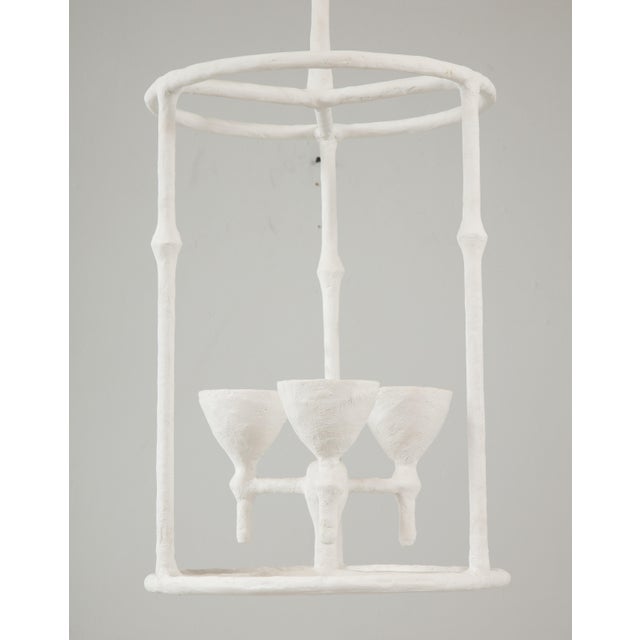 Plaster Alard three-arm fixture. This fixture is UL wired. One in stock. NOTE: We highly recommend that our plaster items...