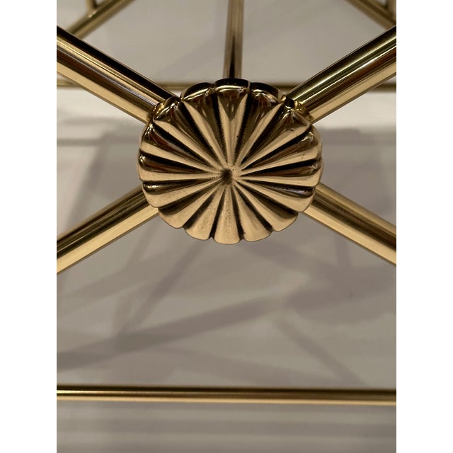 Glamorous Hollywood Regency bench having polished brass base and sensational printed leather woodland animal motif...