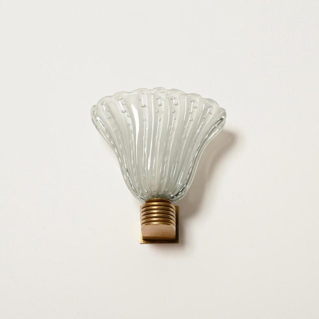 Marvelous pair of art deco murano sconces by barovier. These gorgeous bellflower-shaped sconces were produced in italy...