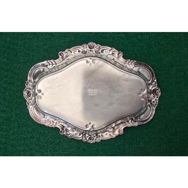 The Wallace Sterling Silver Meadow Rose #4114 Bon Bon Candy Dish is a beautiful piece of silverware made in the United...