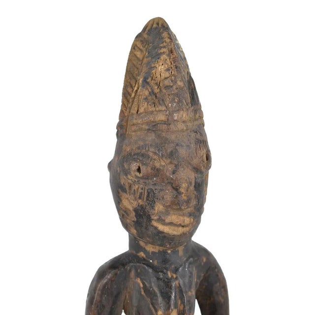 Ibeji figures, carved by the Yoruba people of Nigeria, are wooden twin sculptures holding cultural significance in Yoruba...