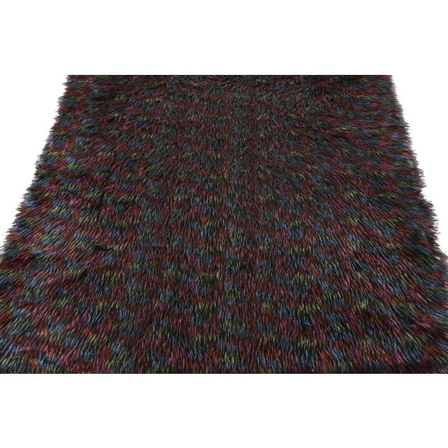 Hand-knotted in wool, a vintage 5x9 Tulu rug joining Rug & Kilim’s Antique & Vintage collection. Originating from Turkey...