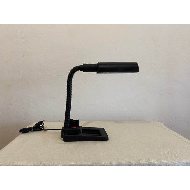 Very good vintage condition with minor signs of age and use. No significant damage. The flexible gooseneck and adjustable...
