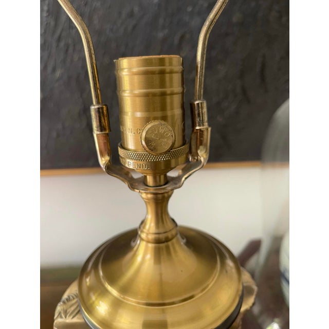 Fantastic lamp by high-end lamp, manufacturer Wildwood. Very heavy lamp weighing over 10 pounds. The body is a cast-iron...