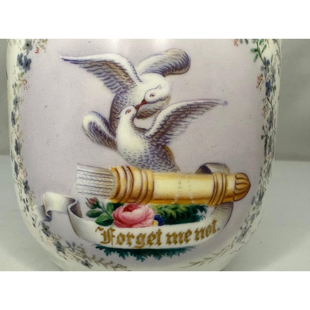 Antique Hand Painted "Forget Me Not" Cup & Saucer for your consideration. The cup measures approx. 3 1/8 inches tall and...