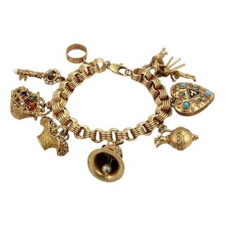 Mid 20th Century Hefty Multicolor Gemstone 9 Charm 14k Yellow Gold Bracelet For Sale