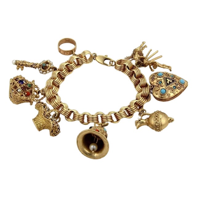 Mid 20th Century Hefty Multicolor Gemstone 9 Charm 14k Yellow Gold Bracelet For Sale