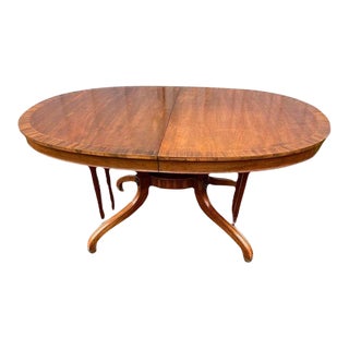 Late 20th Century Recency Style Rosewood Banded Mahogany Oval Extension Dining Table With Leaf For Sale