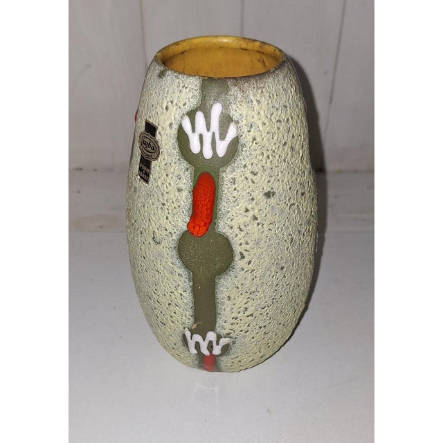 Mid-Century Modern German Ceramic Vase by Jasba, 1960s, in Very Good conditions. Designed 1960 to 1969 This piece has an...