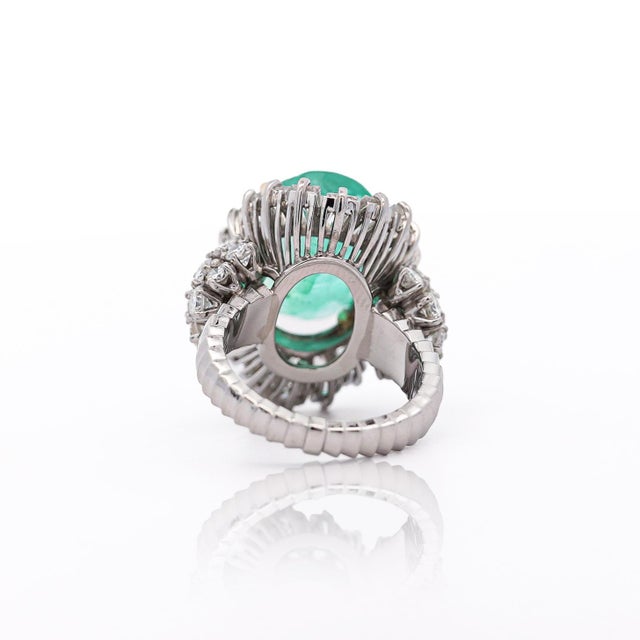 Metal 1990s 6.8 Carat Oval Cut Colombian Emerald and Diamond Platinum Ring, Size 4.5 For Sale - Image 7 of 13