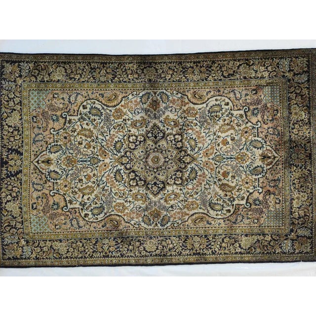 This master piece is a pure silk pile genuine hand made exceptionally fine vintage Persian Qum. Made pre revolution with...