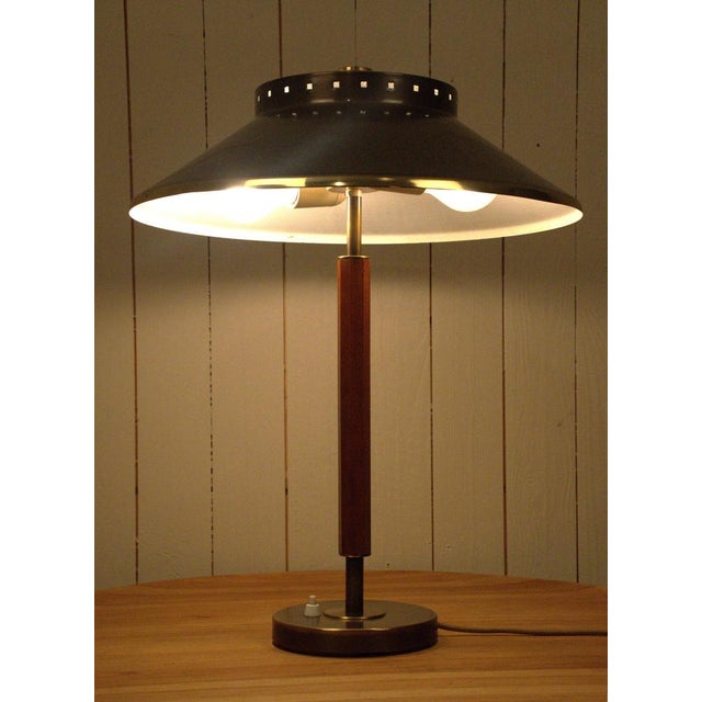 Swedish brass and teak table lamp, modell 8445 by boréns, 1940´s, there are two lamps available. The lamps are in great...